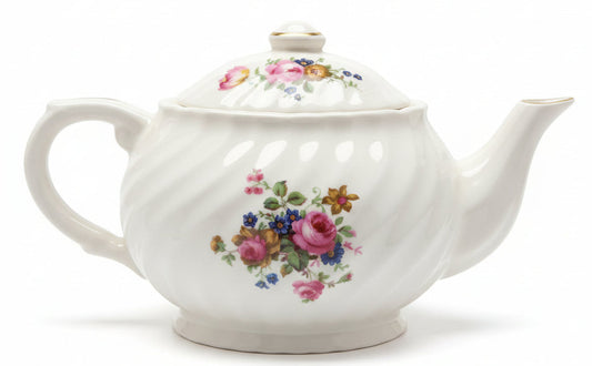 Tetera de porcelana antigua con delicados diseños florales en ambas caras/ Englad