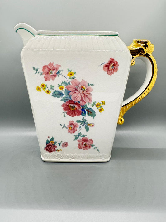 Jarra vintage Harker Pottery con flores y asa dorada