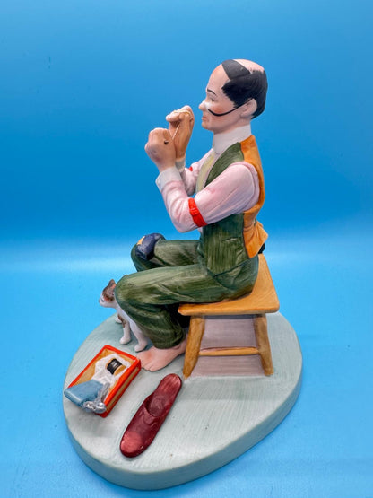 Norman Rockwell, se muestra se llama&nbsp;"Man Threading a Needle"&nbsp;(Hombre enhebrando una aguja)