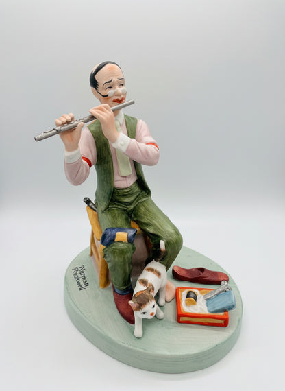 Norman Rockwell, se muestra se llama&nbsp;"Man Threading a Needle"&nbsp;(Hombre enhebrando una aguja).