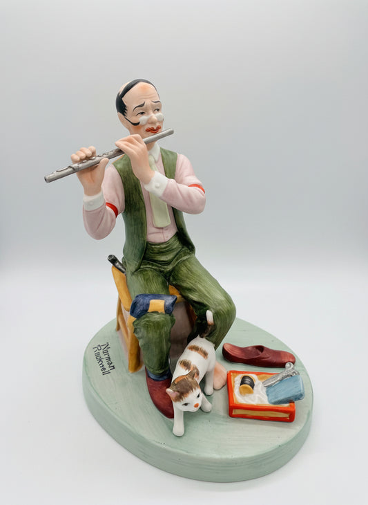 Norman Rockwell, se muestra se llama&nbsp;"Man Threading a Needle"&nbsp;(Hombre enhebrando una aguja).