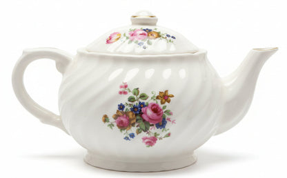 Tetera de porcelana antigua con delicados diseños florales en ambas caras/ Englad
