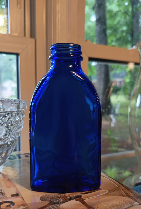 La botella de leche de magnesia Phillips de vidrio azul cobalto vintage mide 14 cm.